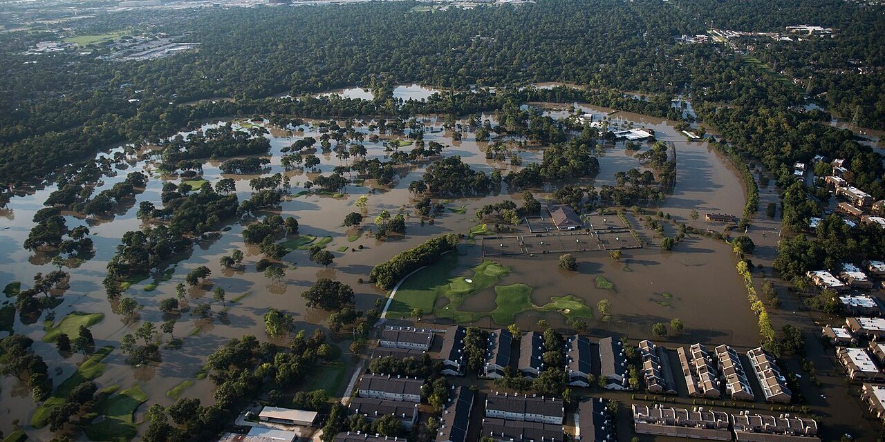 Aerial view of a flooded neighborhood and golf course in Houston after Hurricane Harvey.